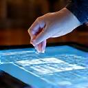 Architect working on a digital design plan for a home renovation project on a computer